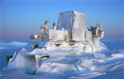 snow-covered-construction-equipment-bulldozer.png